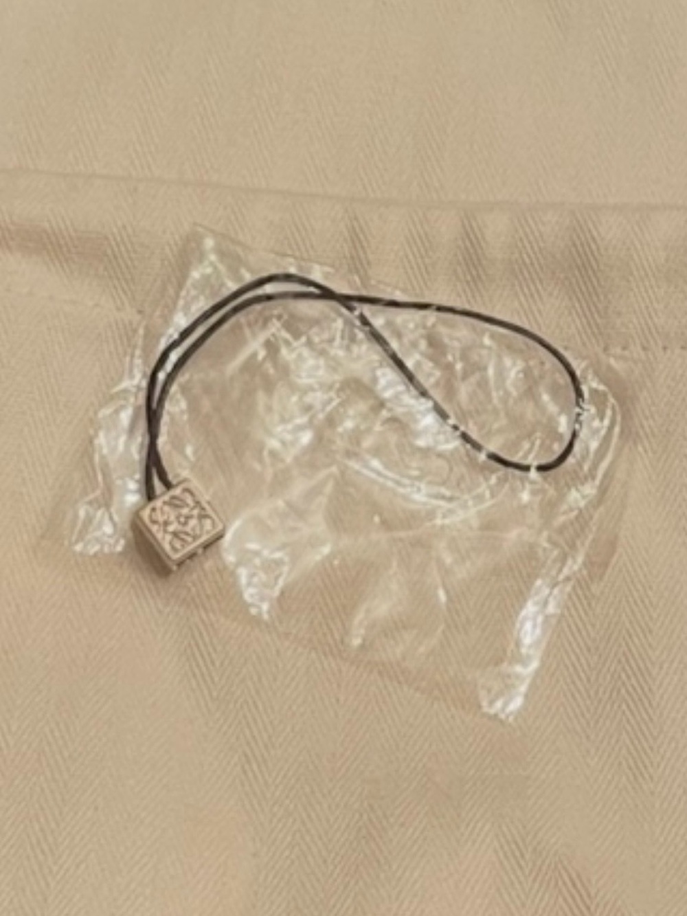 Loewe tag and dustbag